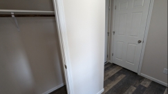 Guest closet-door to basement